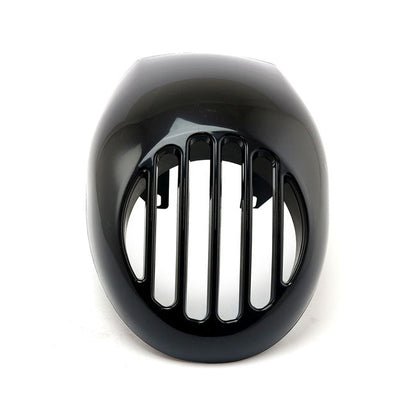 Upper headlamp fly fairing with integrated headlamp grill