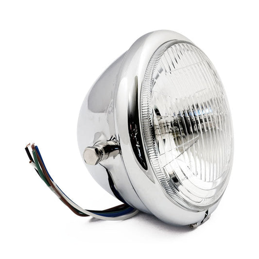 Bates style 5-3/4" H4 headlamp. side mount. Chrome